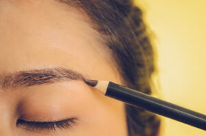 woman eyebrow pencil